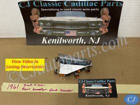 OEM 1961 Cadillac Deville Eldorado Fleetwood LEFT DRIVER SIDE REAR BUMPER CHROME GRILL DIVIDER ORNAMENT #1475860