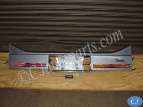 OEM 1985 1986 1987 1988 Cadillac Deville Fleetwood FWD REAR TRUNK BUMPER FILLER PANEL TRIM WITH REFLECTORS #20644831