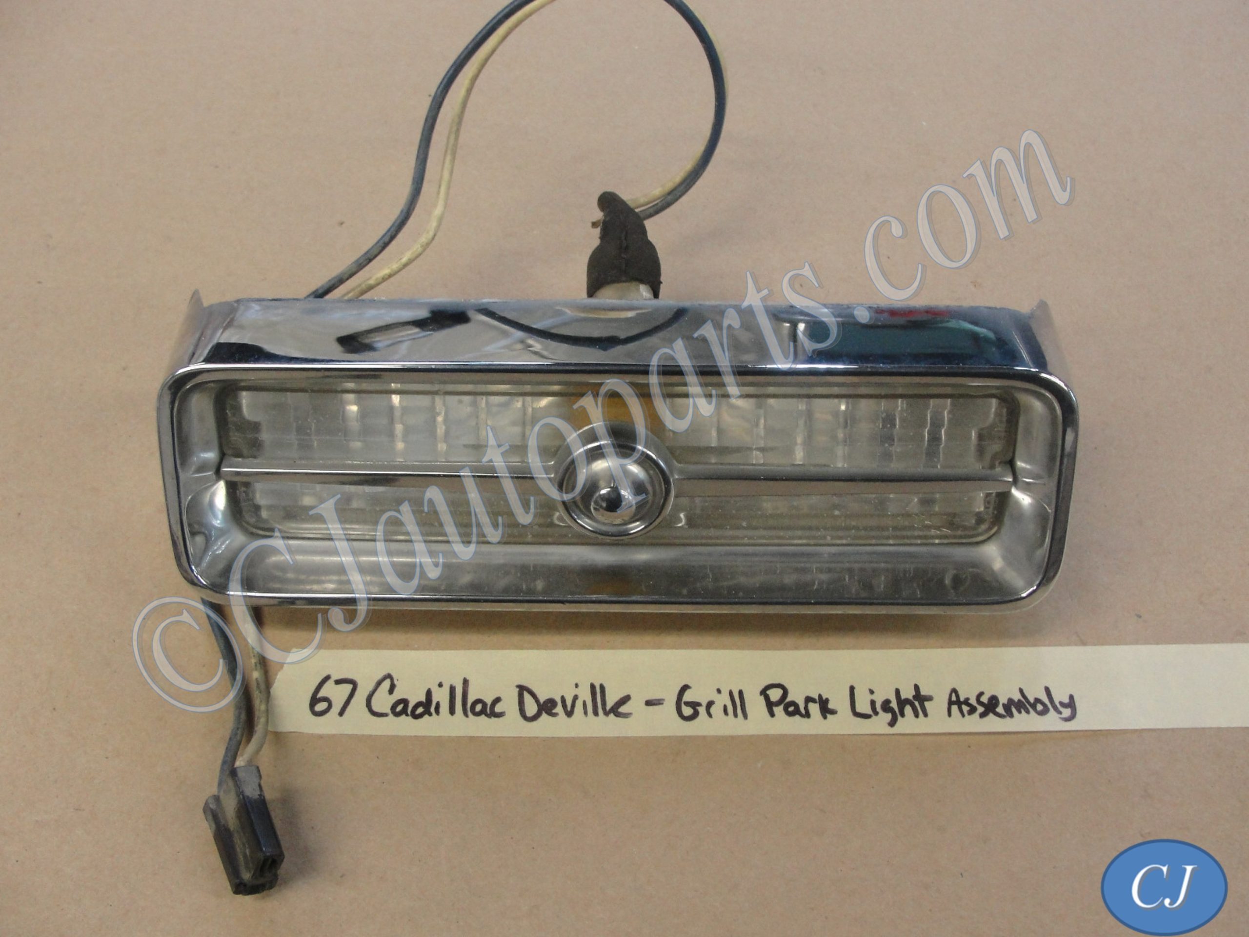1967 Cadillac Deville Fleetwood Calais GRILL PARK TURN SIGNAL LIGHT LENS CHROME BEZEL TRIM HOUSING #5959174