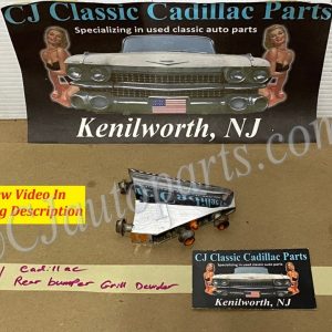 OEM 1961 Cadillac Deville Eldorado Fleetwood LEFT DRIVER SIDE REAR BUMPER CHROME GRILL DIVIDER ORNAMENT #1475860