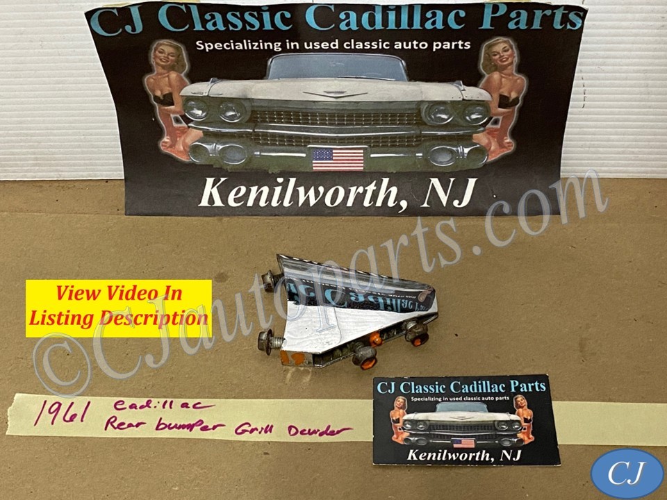 OEM 1961 Cadillac Deville Eldorado Fleetwood LEFT DRIVER SIDE REAR BUMPER CHROME GRILL DIVIDER ORNAMENT #1475860