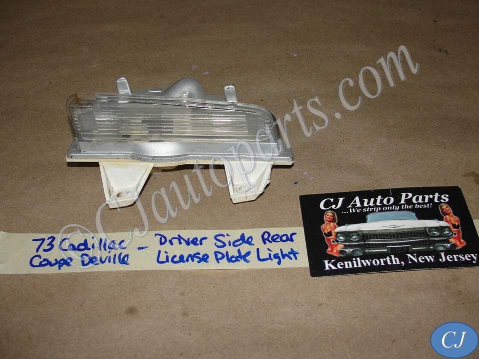 OEM 1973 Cadillac Deville Calais Fleetwood LEFT DRIVER SIDE REAR LICENSE PLATE LIGHT LENS #911965